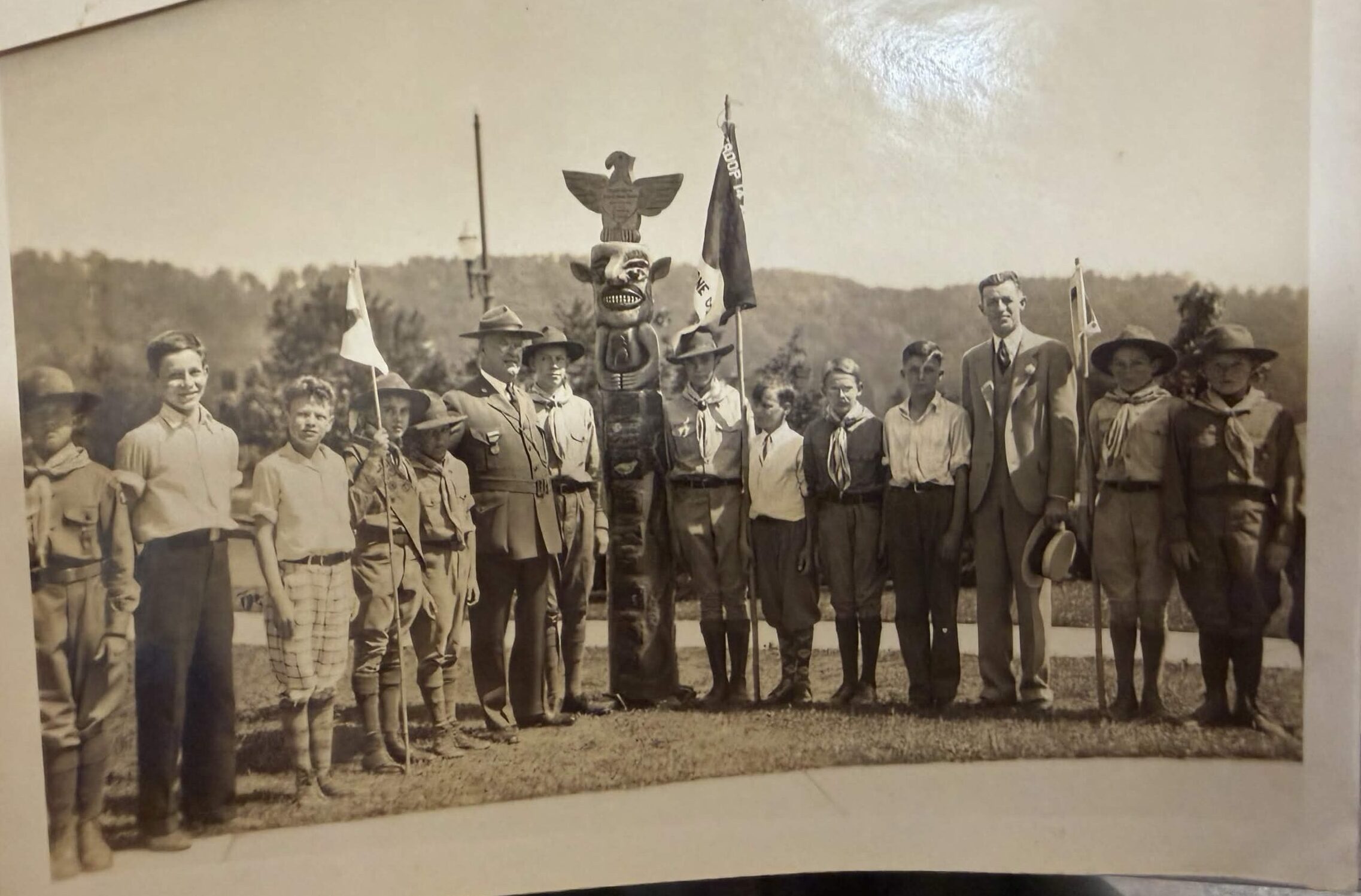 Image of the Daniel Boone Council's first Scout Executive, A.W. Allen with a historic totem poll